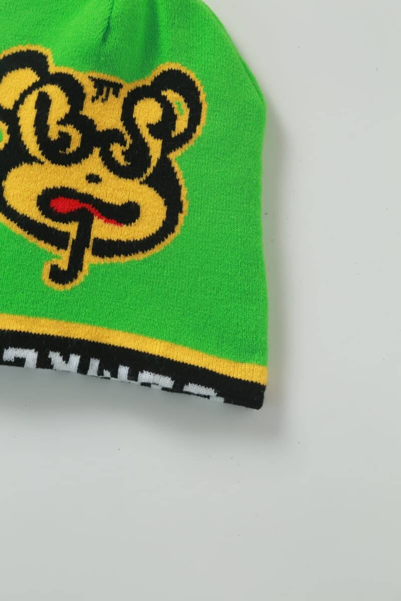 green plain weave skull beanie hat