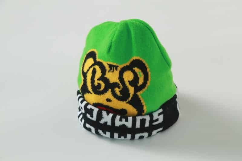 green plain weave skull beanie hat